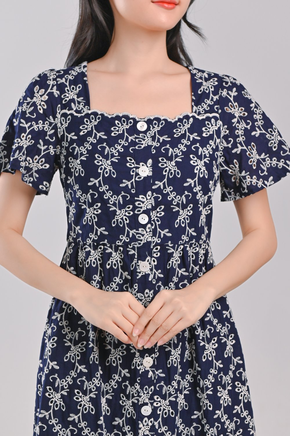 LOVYSE NAVY EYELET MIDI DRESS