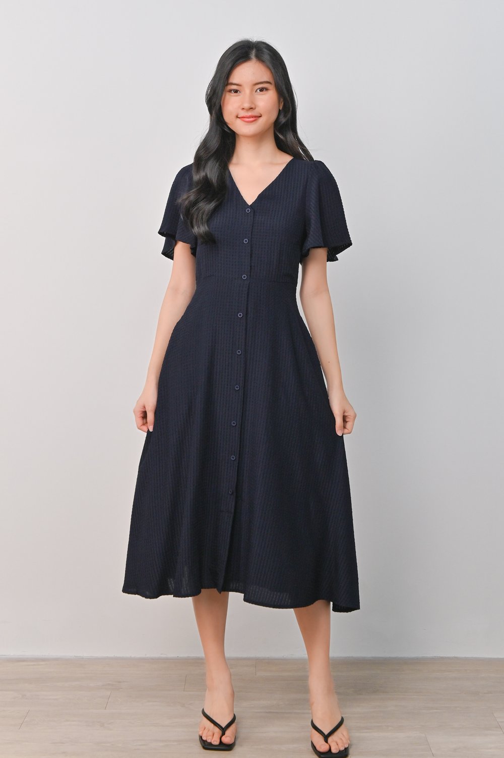 RENDIE TEXTURED SLEEVED BUTTON DRESS IN NAVY