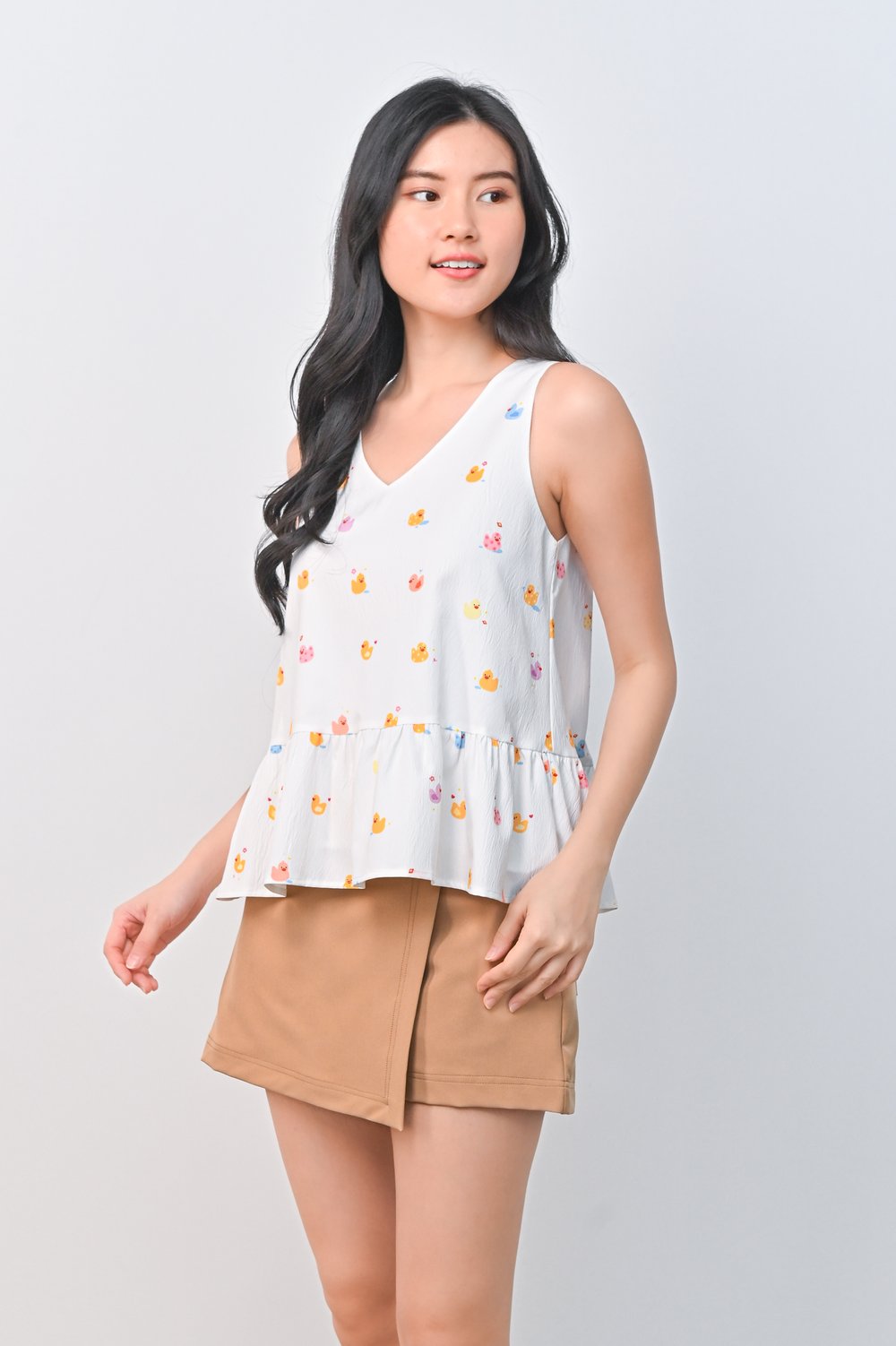 RUBBER DUCKIE WHITE PEPLUM TOP