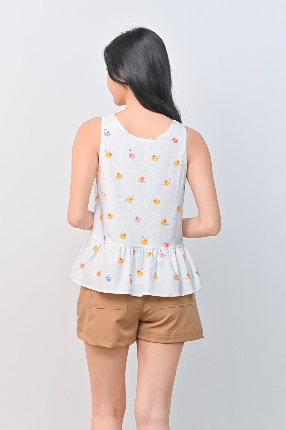 RUBBER DUCKIE WHITE PEPLUM TOP