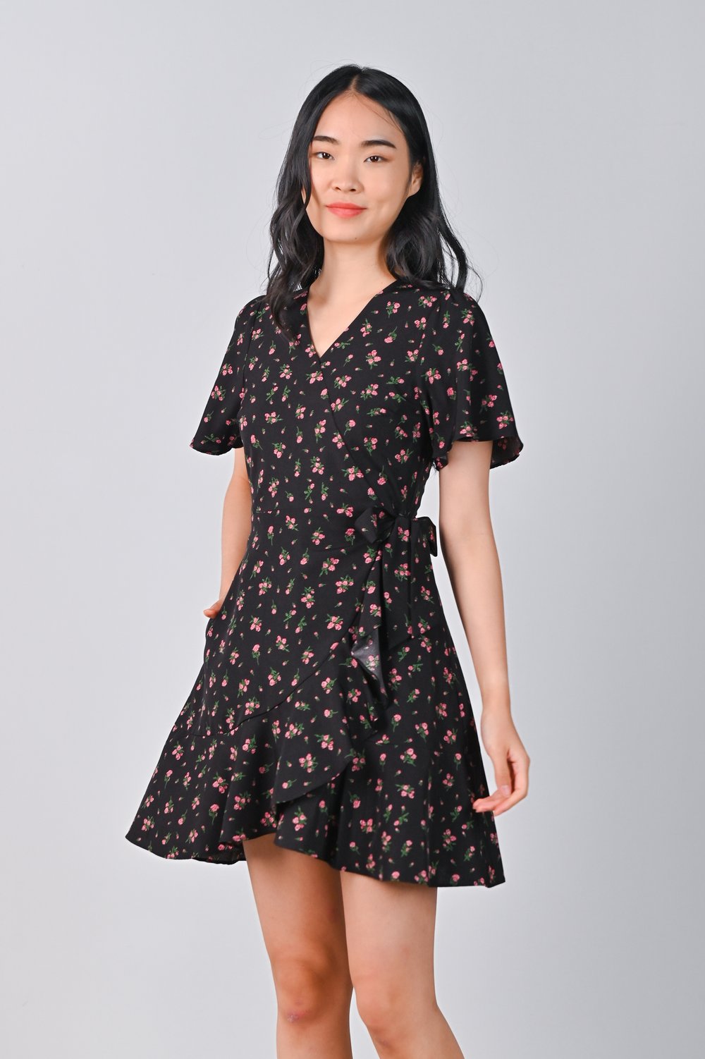 COOPER RUFFLE DRESS-ROMPER IN BLACK FLORAL