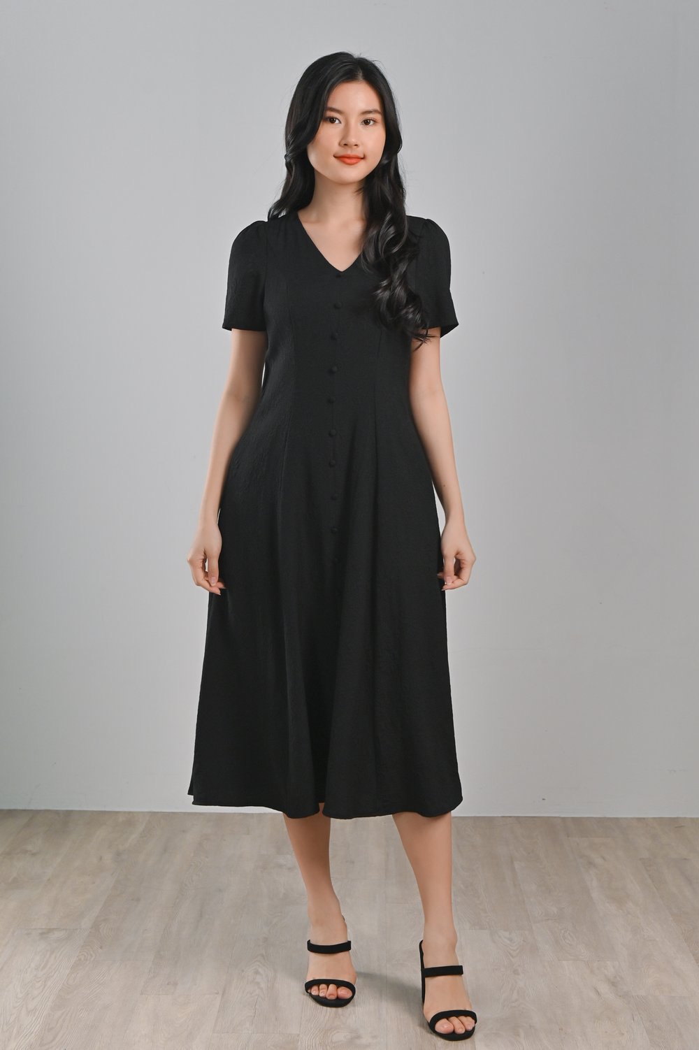 QIMY EMBOSSED BUTTON DRESS IN BLACK