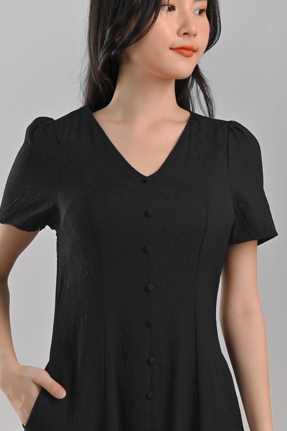 QIMY EMBOSSED BUTTON DRESS IN BLACK