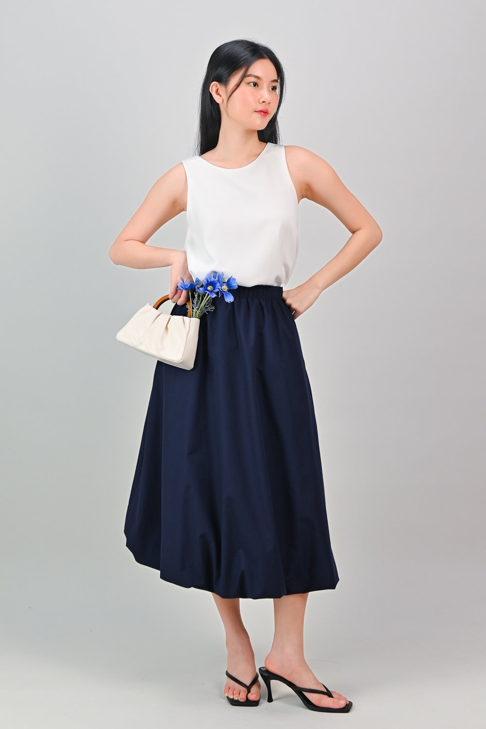 BUBLE BUBBLE MIDI SKIRT IN NAVY