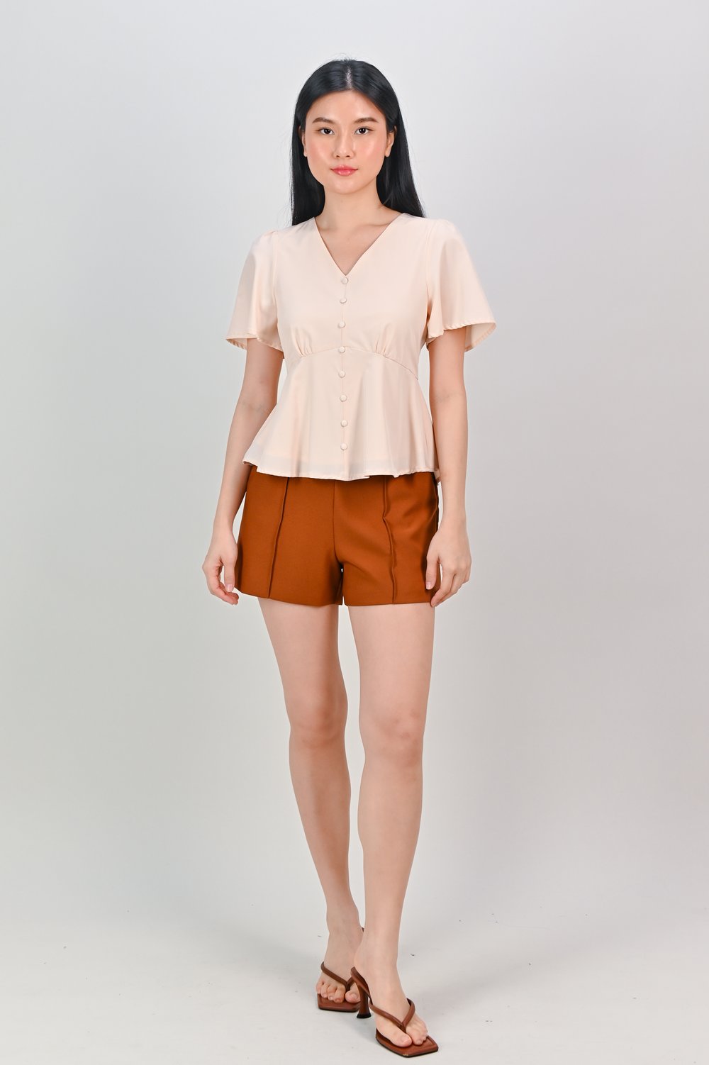 ERICA SLEEVED PEPLUM TOP IN SAND