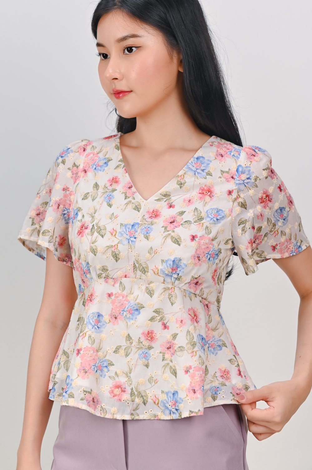 SPRING STITCH SLEEVED PEPLUM TOP
