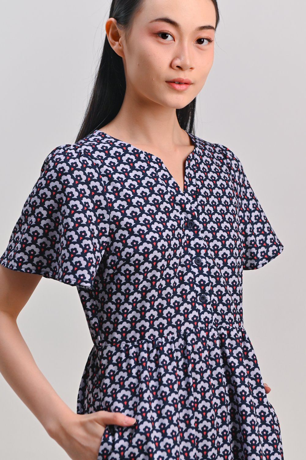 NAVY TRUMPET FLORAL SLEEVED BUTTON DRESS