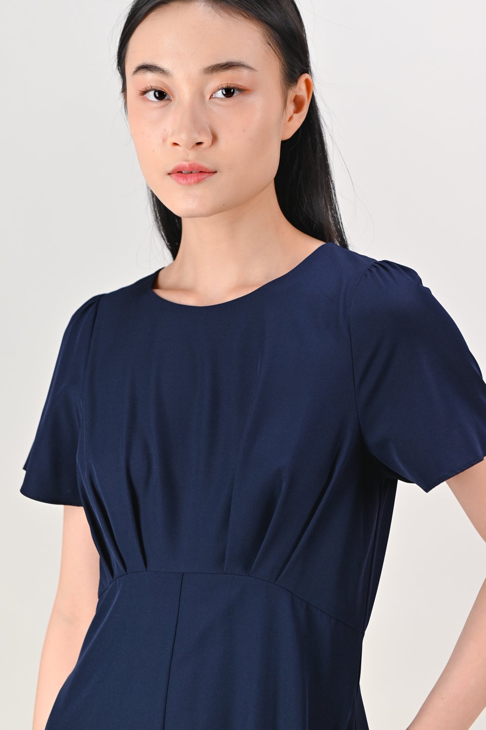 PANELLE CURVED-WAIST SLIT MAXI DRESS IN NAVY