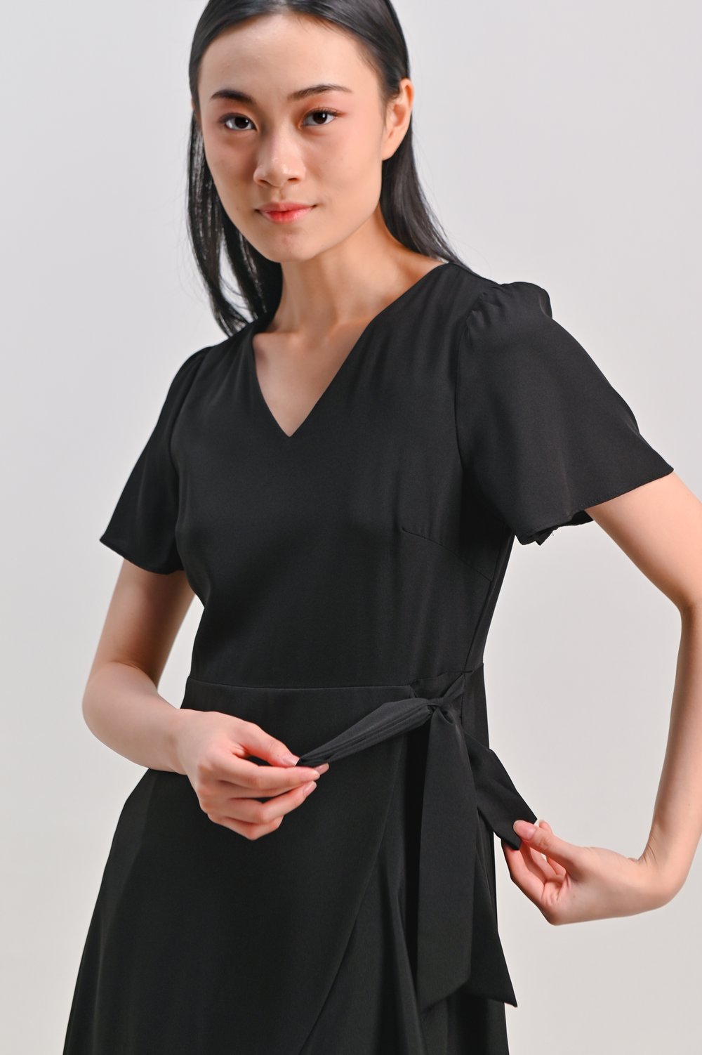 ROISIN SLEEVED FAUX-WRAP RUFFLE DRESS IN BLACK