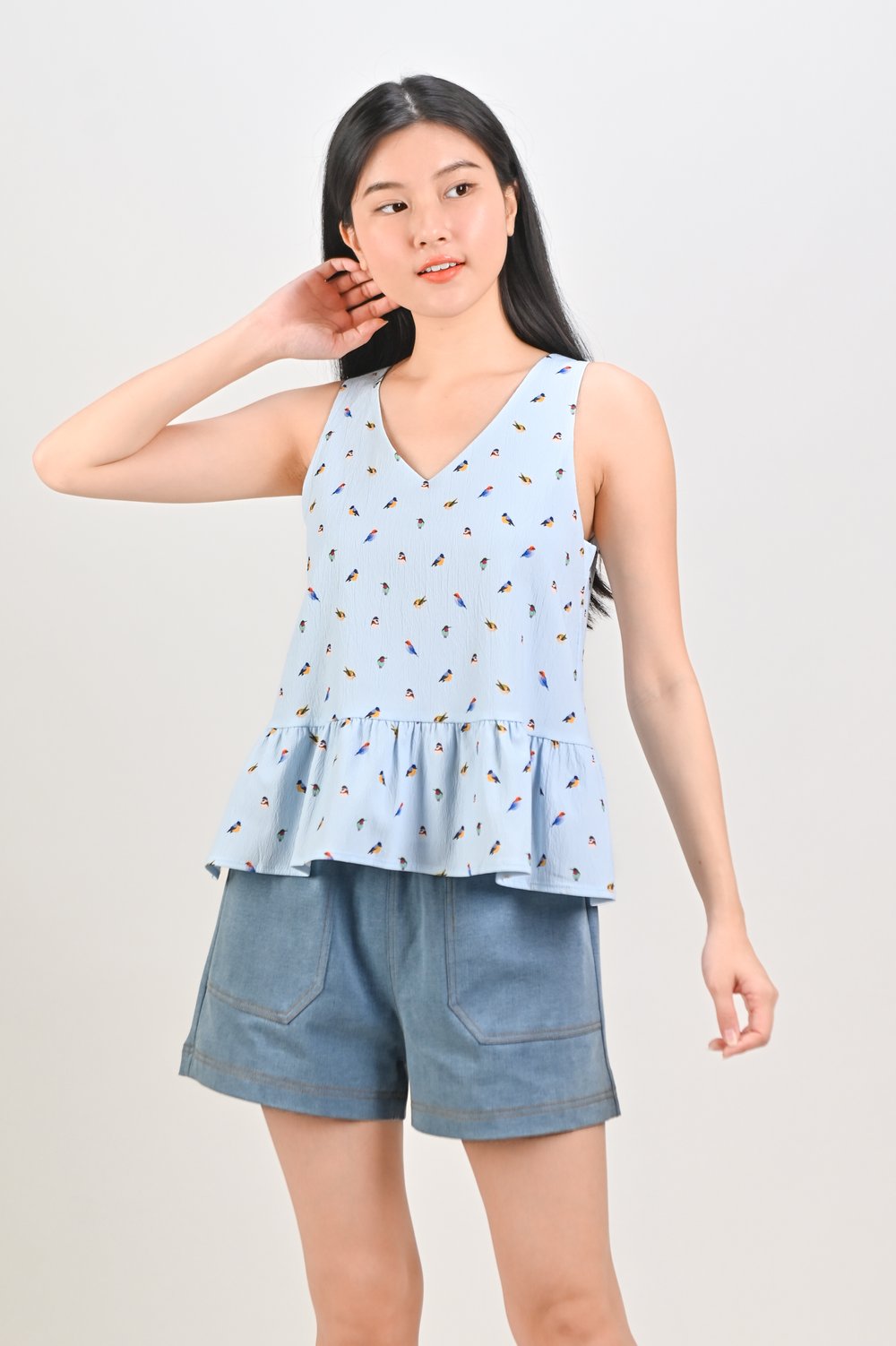LITTLE WINGS SLEEVELESS PEPLUM TOP