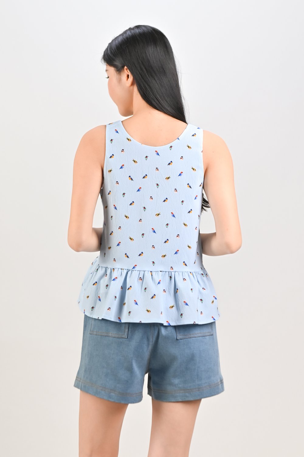 LITTLE WINGS SLEEVELESS PEPLUM TOP