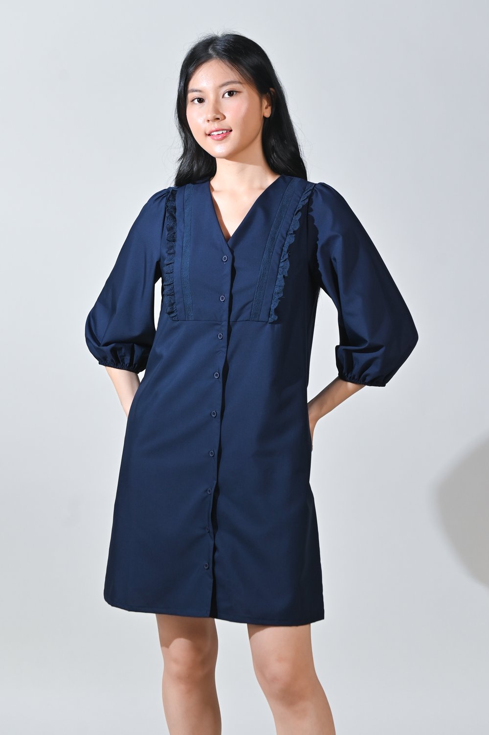 MIO SLEEVED EYELET FRILL BUTTON DRESS IN NAVY