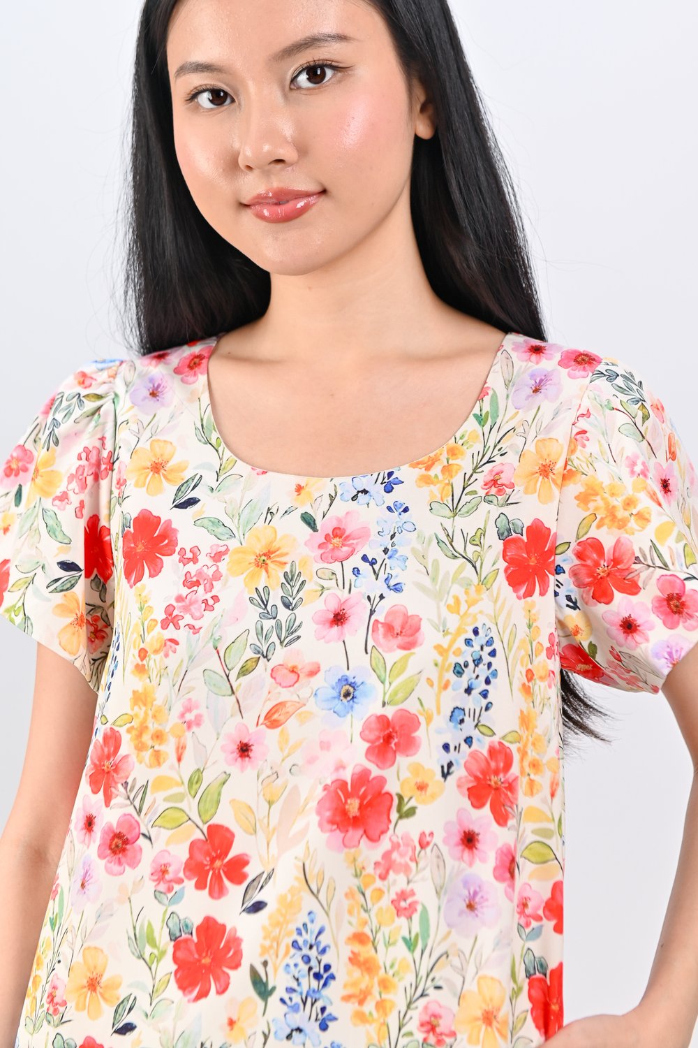 MAREVIA SLEEVED CURVED-PLEAT DRESS IN VIBRANT FLORAL