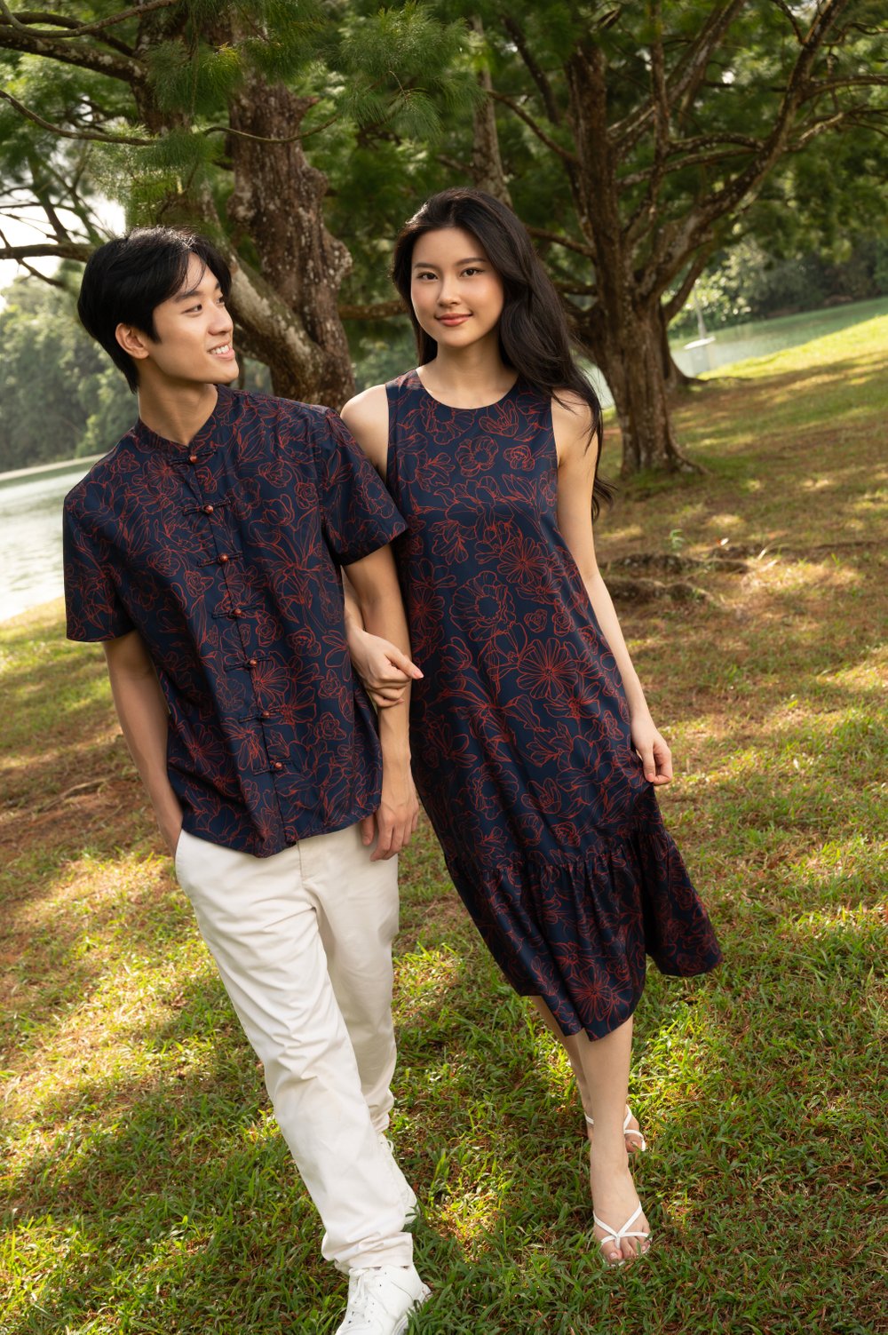 EMBER GLOW SLEEVELESS DROPWAIST MIDI DRESS