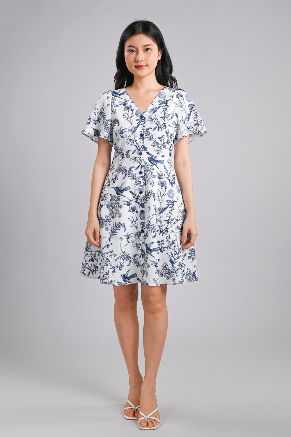 NAVY HUMMINGBIRD V-NECK SLEEVED FLOWER-BUTTON DRESS