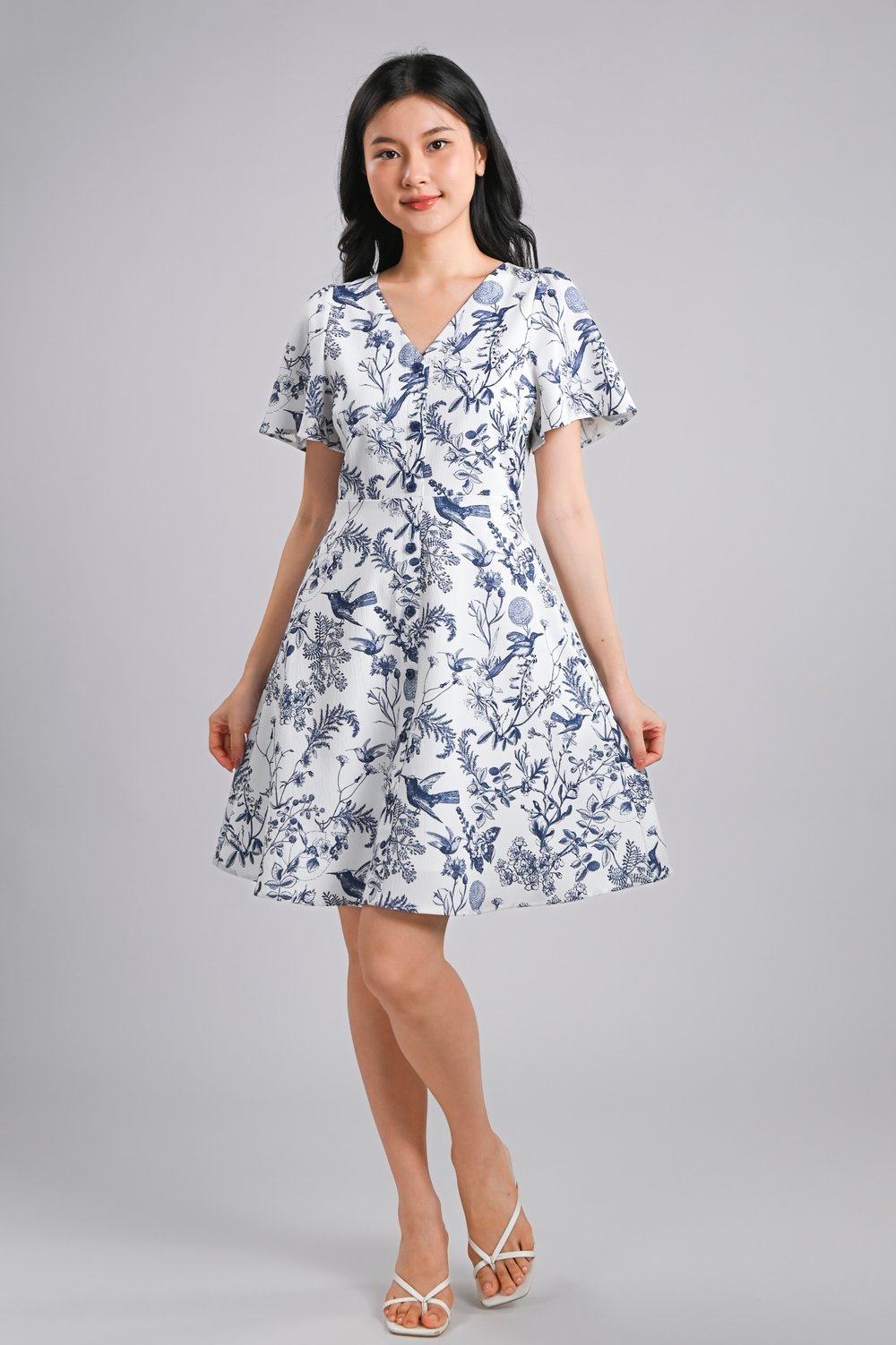 NAVY HUMMINGBIRD V-NECK SLEEVED FLOWER-BUTTON DRESS