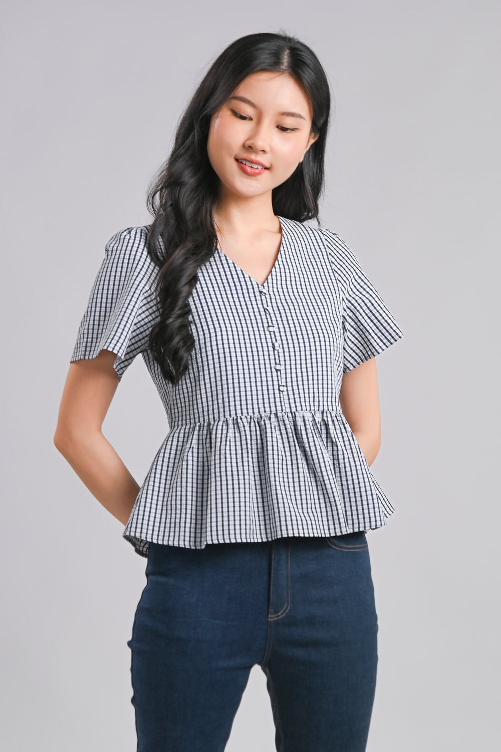 KEIR GRID SLEEVED PEPLUM TOP IN NAVY