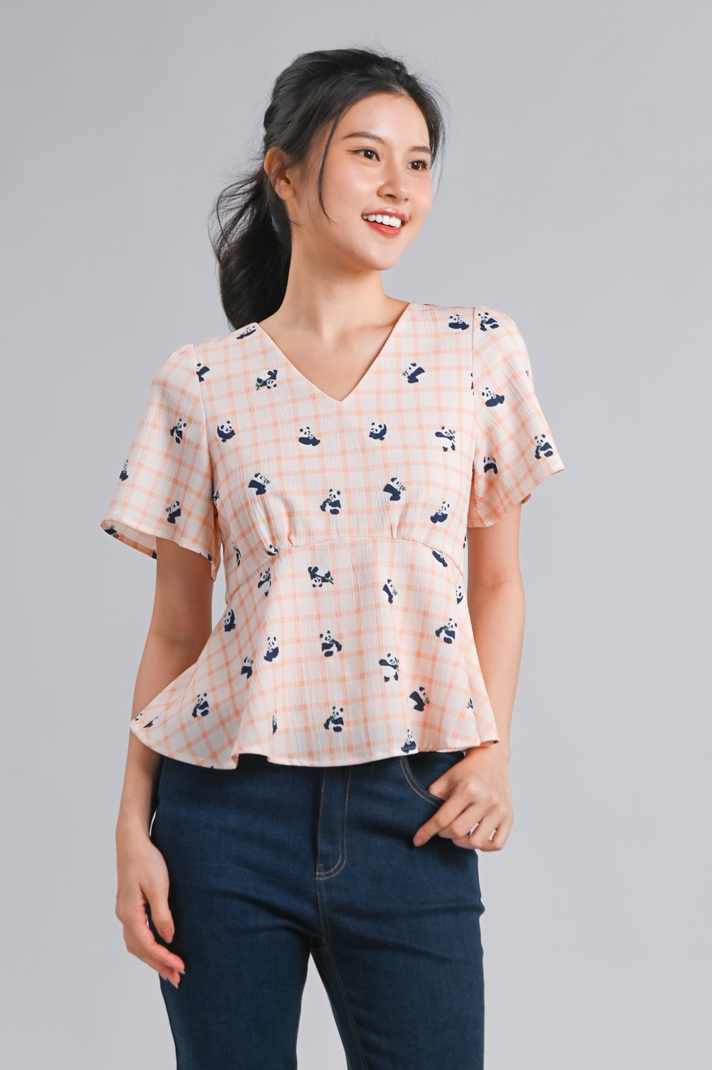 PANDA PARTY ORANGE SLEEVED PEPLUM TOP