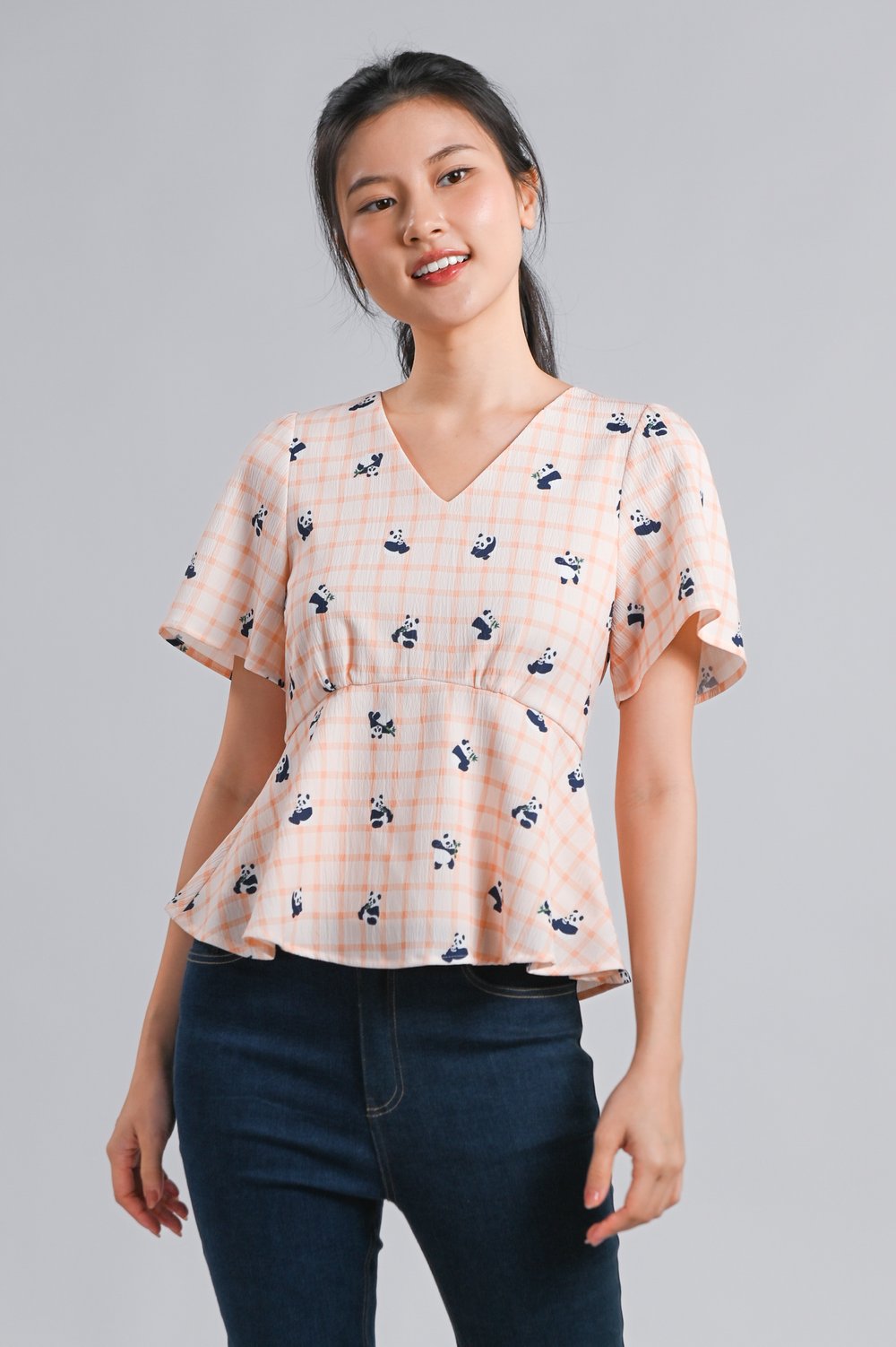 PANDA PARTY ORANGE SLEEVED PEPLUM TOP