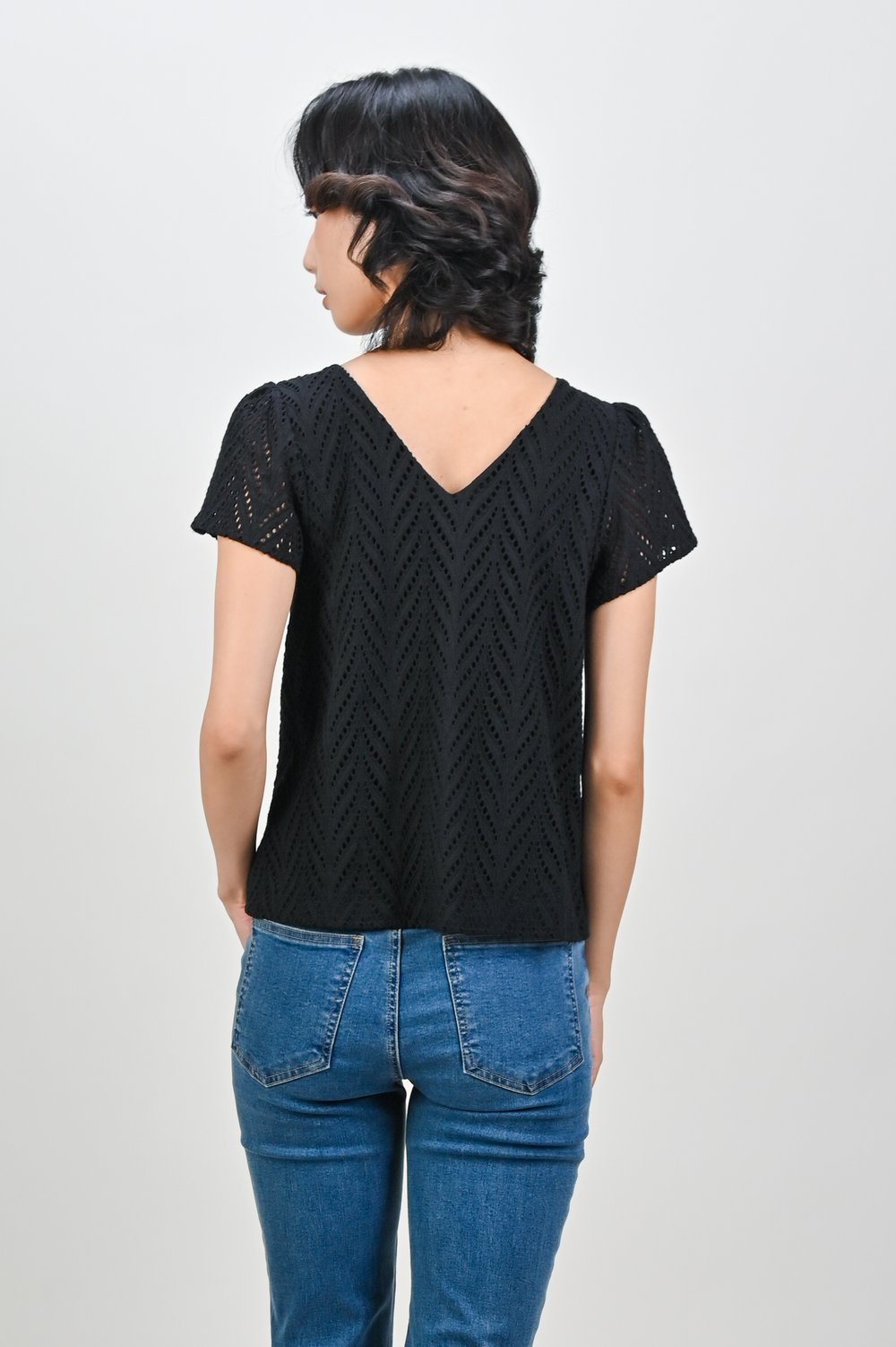ALYSE LEAFY EYELET SLEEVED TOP IN BLACK