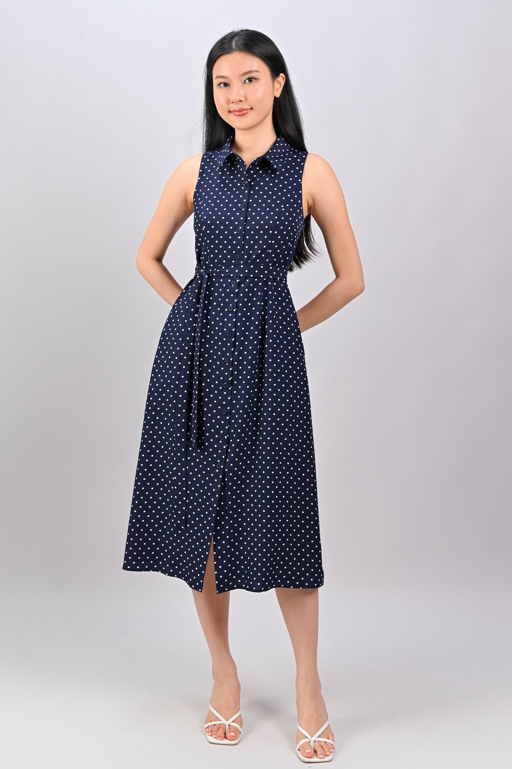 CARIBETH SLEEVELESS SHIRT-DRESS IN NAVY POLKA