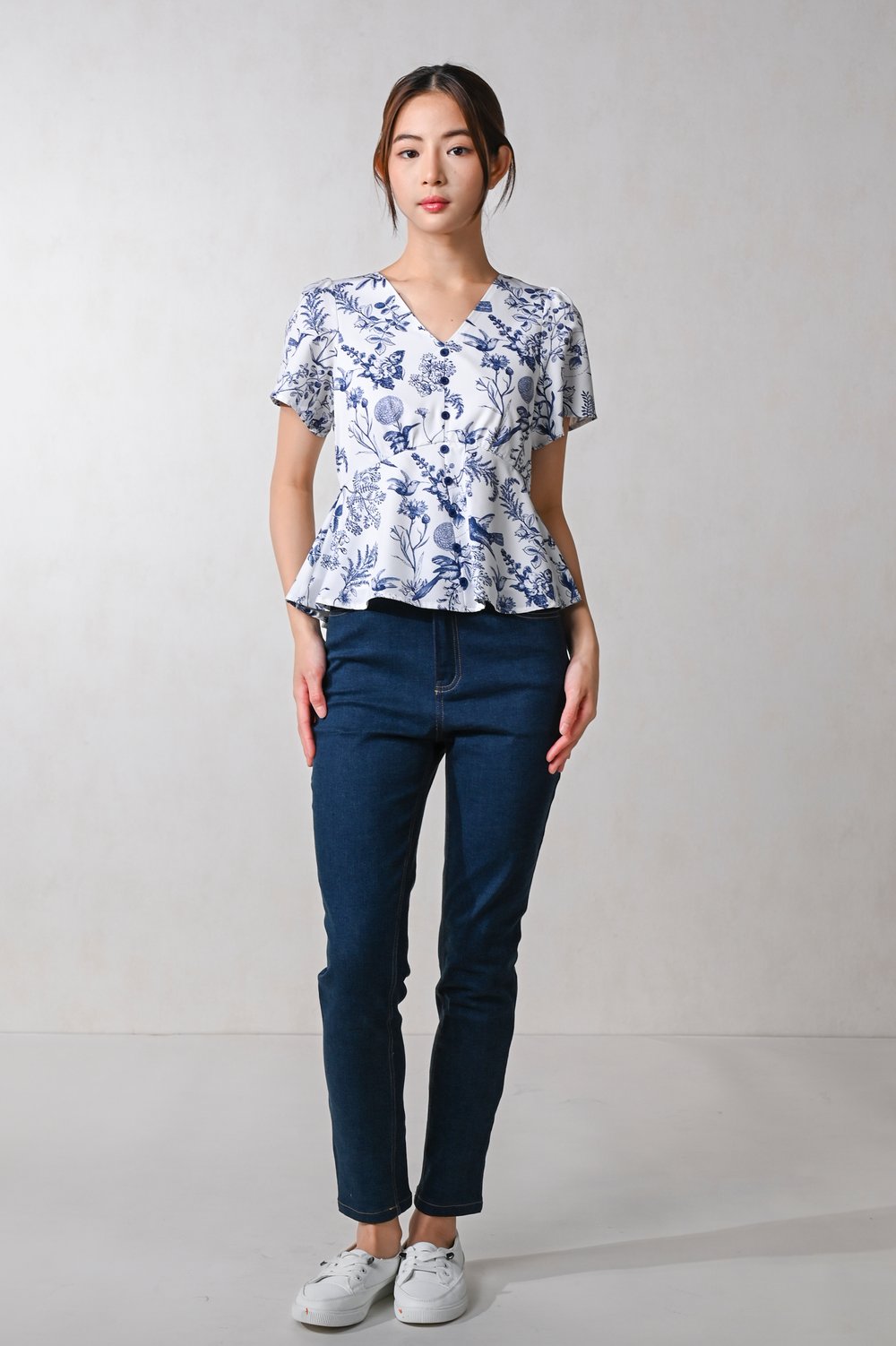 NAVY HUMMINGBIRD SLEEVED PEPLUM TOP