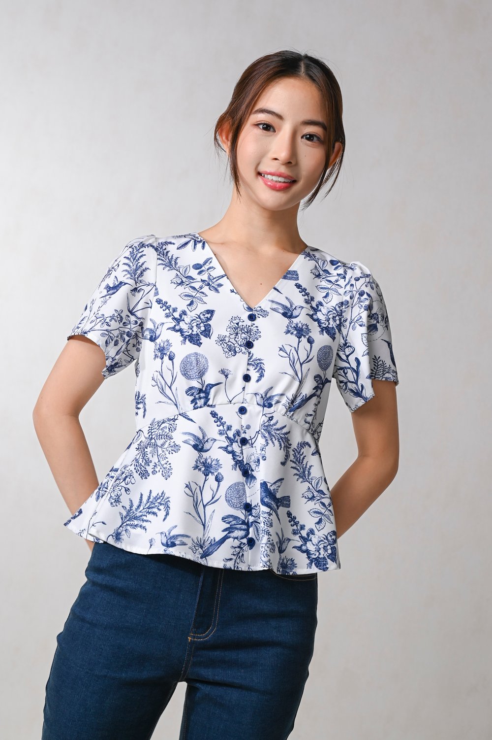 NAVY HUMMINGBIRD SLEEVED PEPLUM TOP