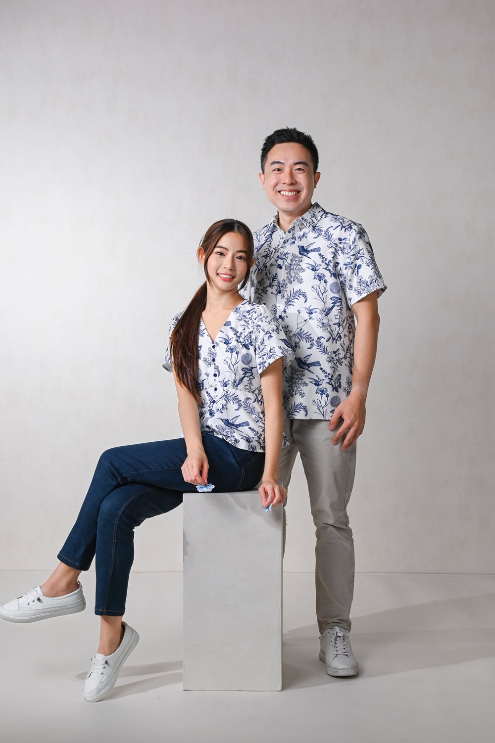 NAVY HUMMINGBIRD SLEEVED PEPLUM TOP