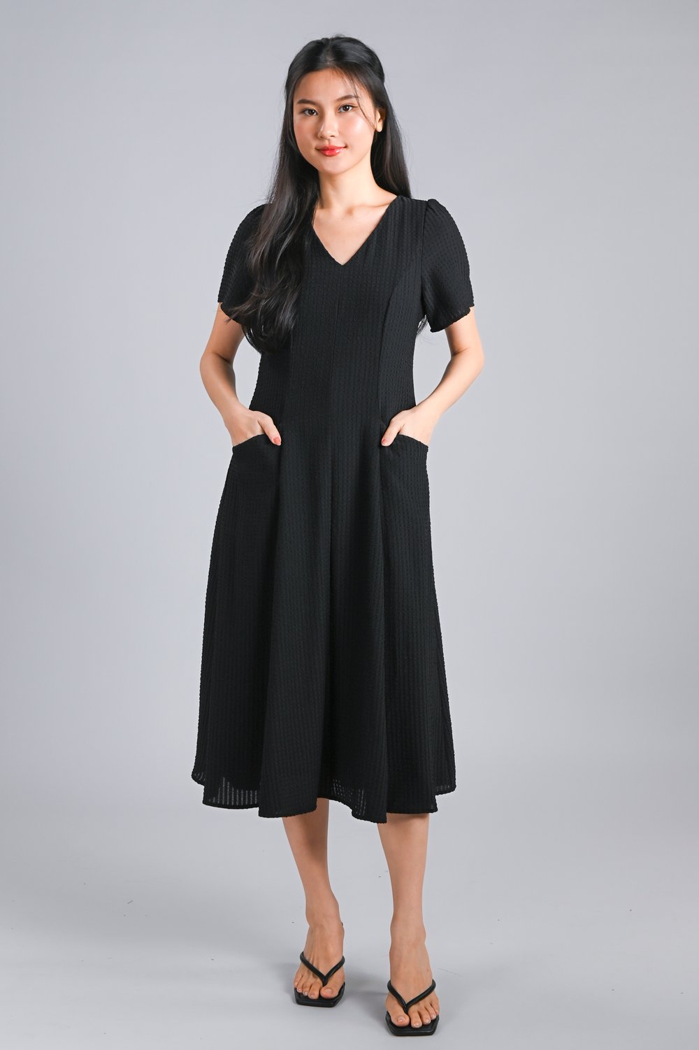 THELIA V-NECK SLEEVED PANELLED MIDI DRESS IN BLACK