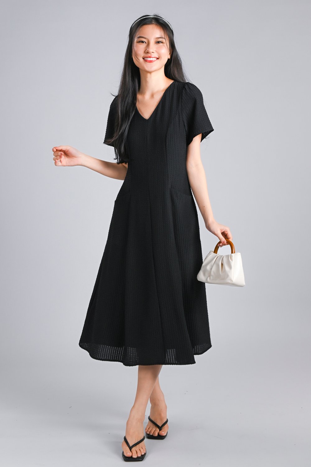 THELIA V-NECK SLEEVED PANELLED MIDI DRESS IN BLACK