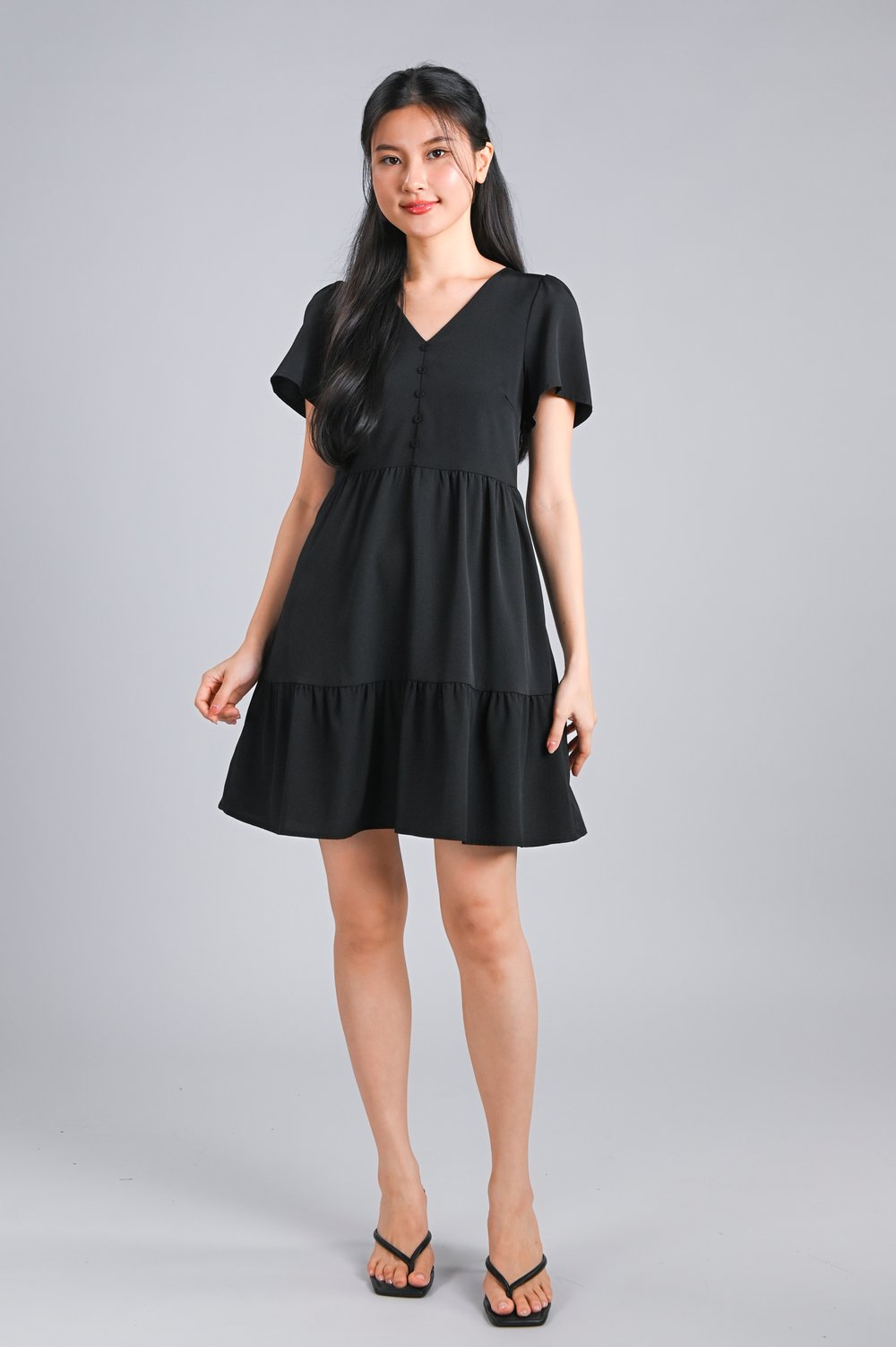STELLA SLEEVED BUTTON FLOUNCE DRESS IN BLACK
