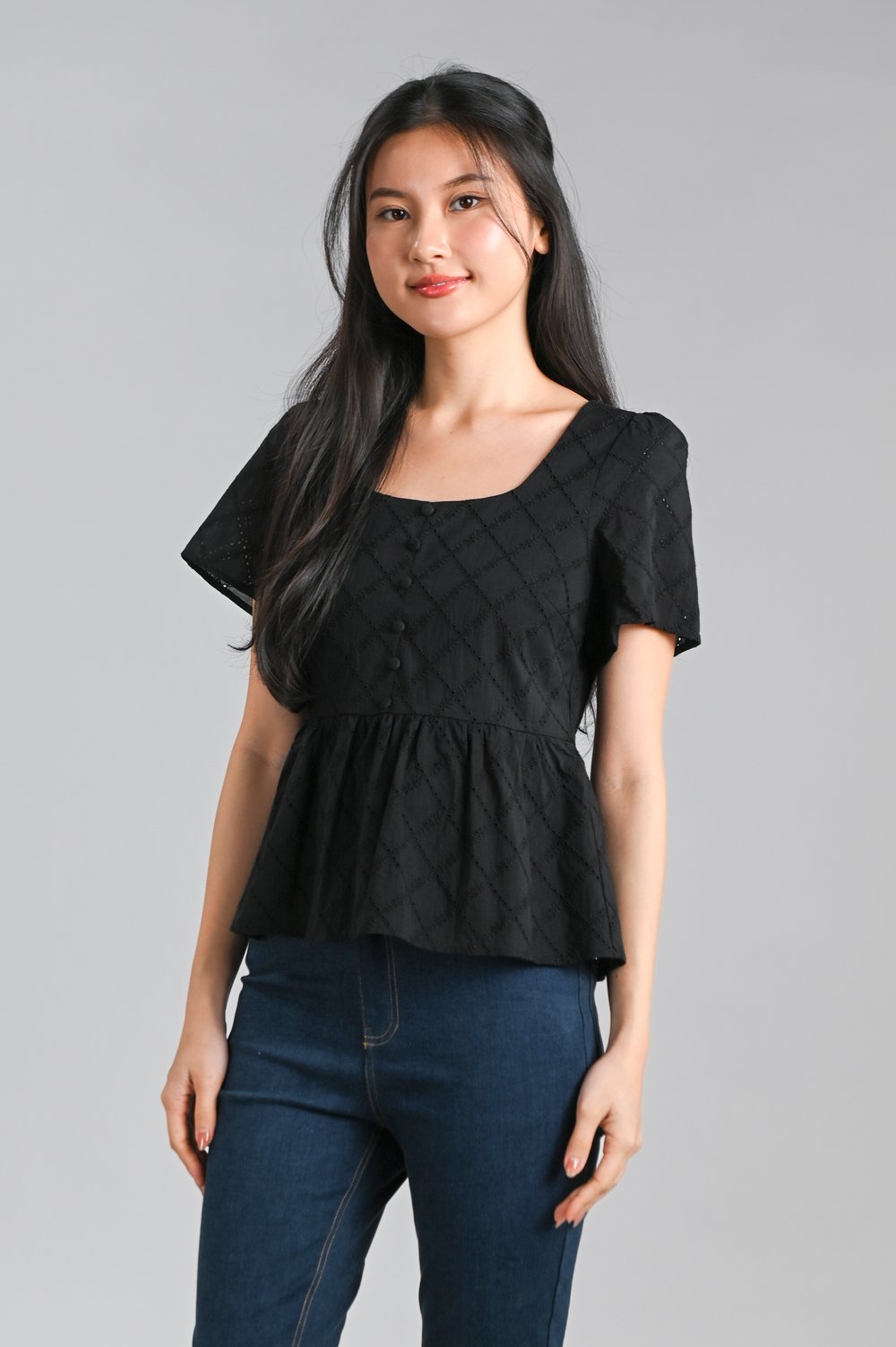 SERAPH EYELET SCOOP-NECK PEPLUM TOP IN BLACK