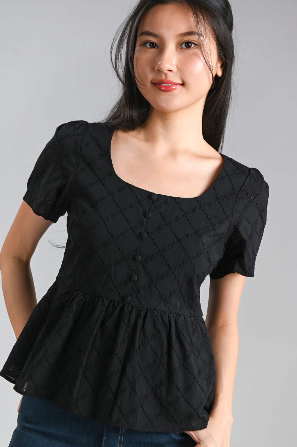 SERAPH EYELET SCOOP-NECK PEPLUM TOP IN BLACK