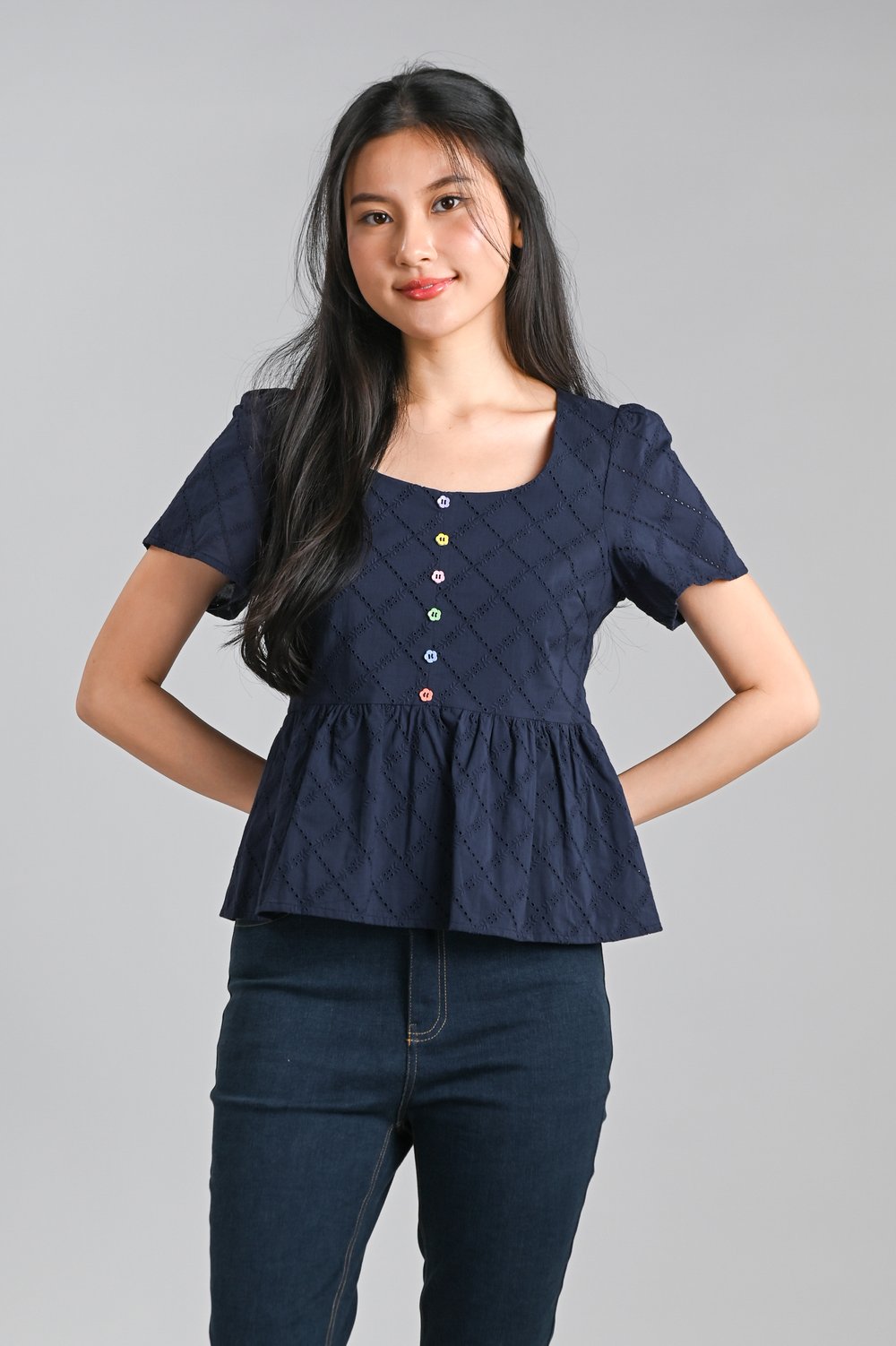 SERAPH EYELET SCOOP-NECK PEPLUM TOP IN NAVY