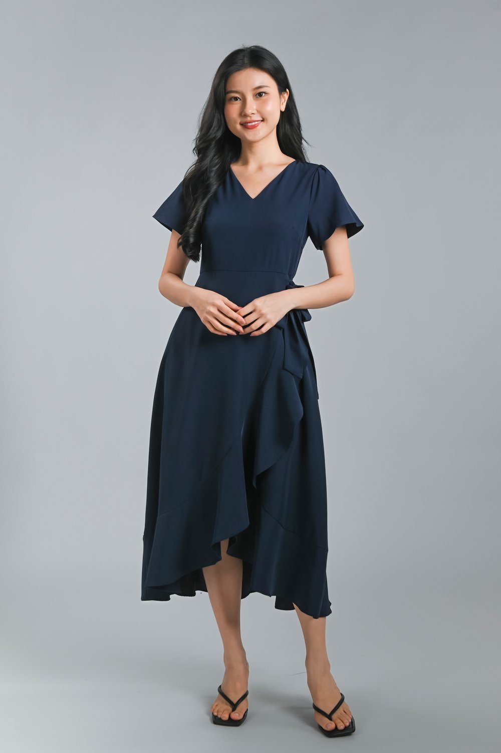 ROISIN SLEEVED FAUX-WRAP RUFFLE DRESS IN NAVY
