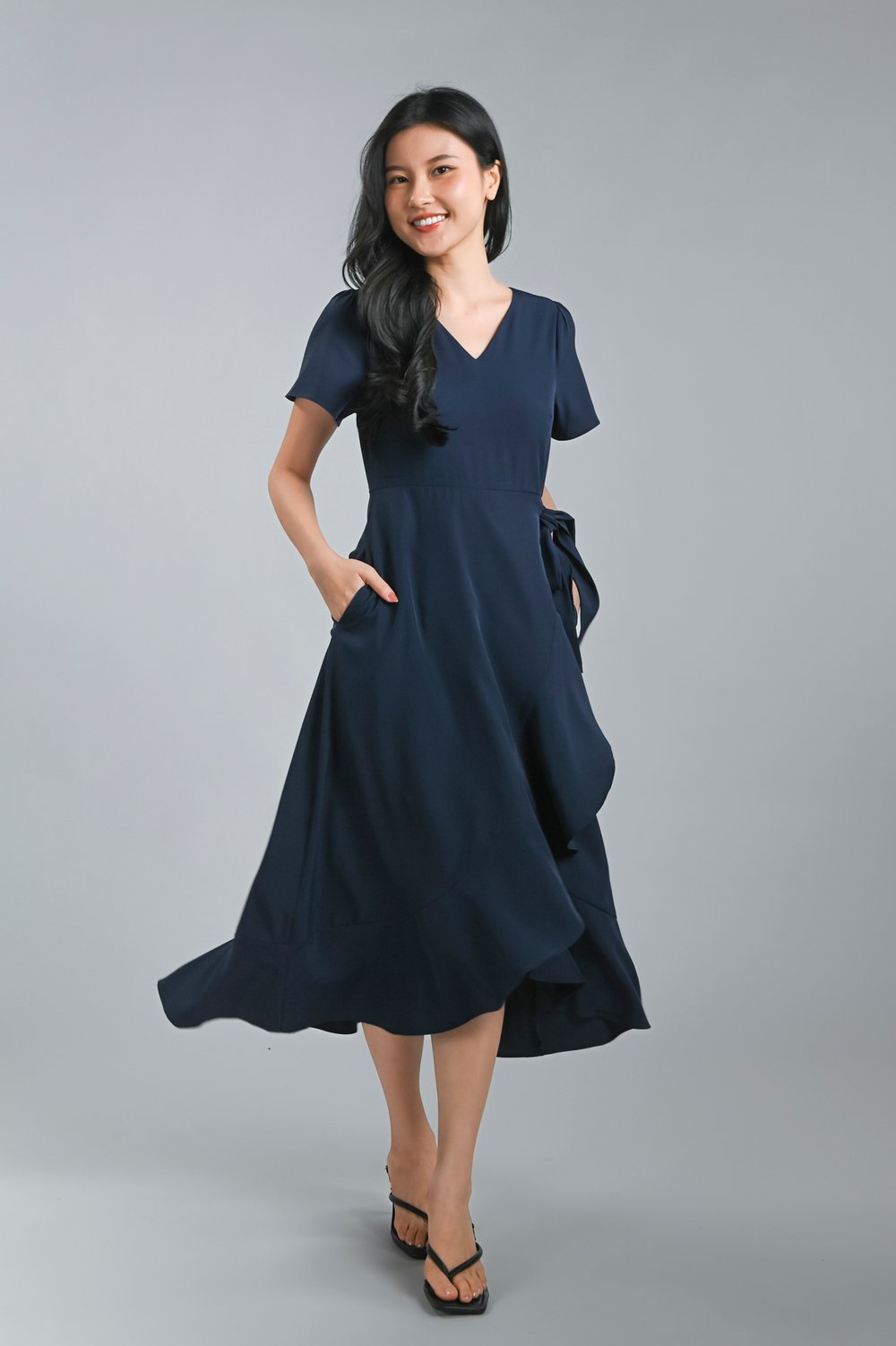 ROISIN SLEEVED FAUX-WRAP RUFFLE DRESS IN NAVY