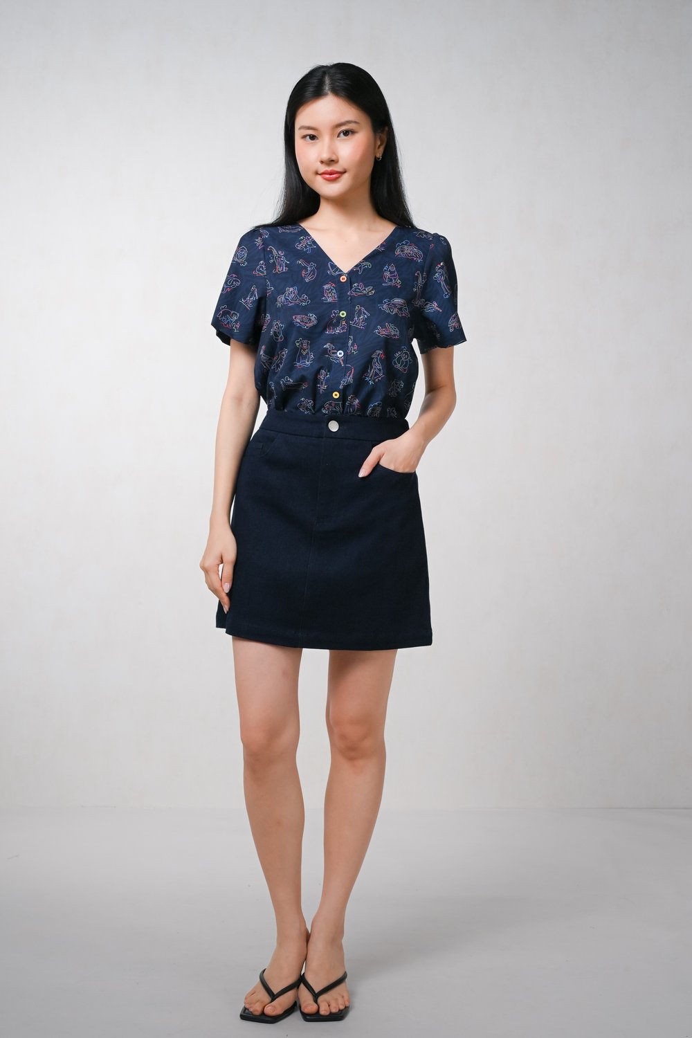 GLOW GETTERS NAVY SLEEVED BUTTON TOP
