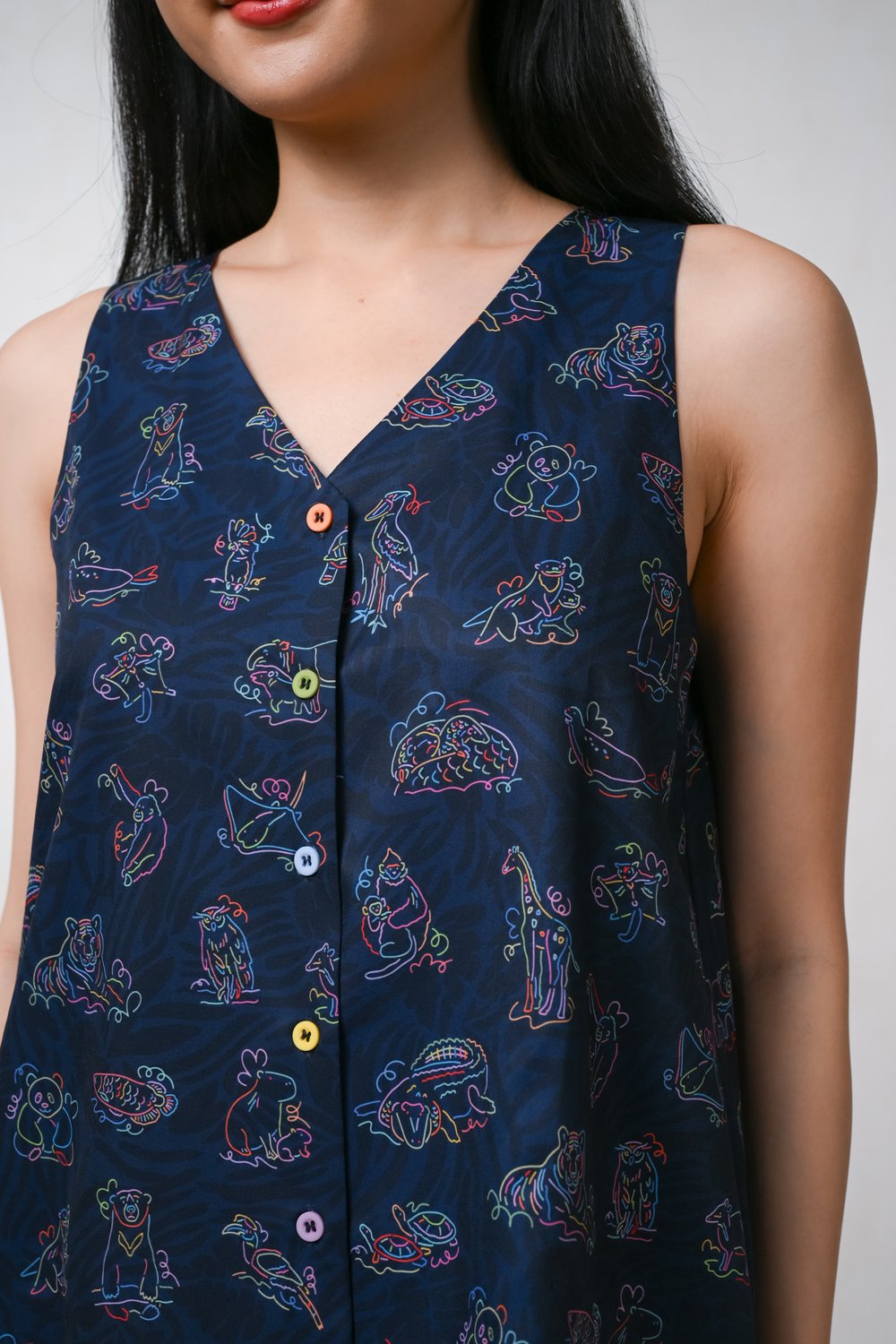 GLOW GETTERS NAVY TWO-WAY BUTTON TOP
