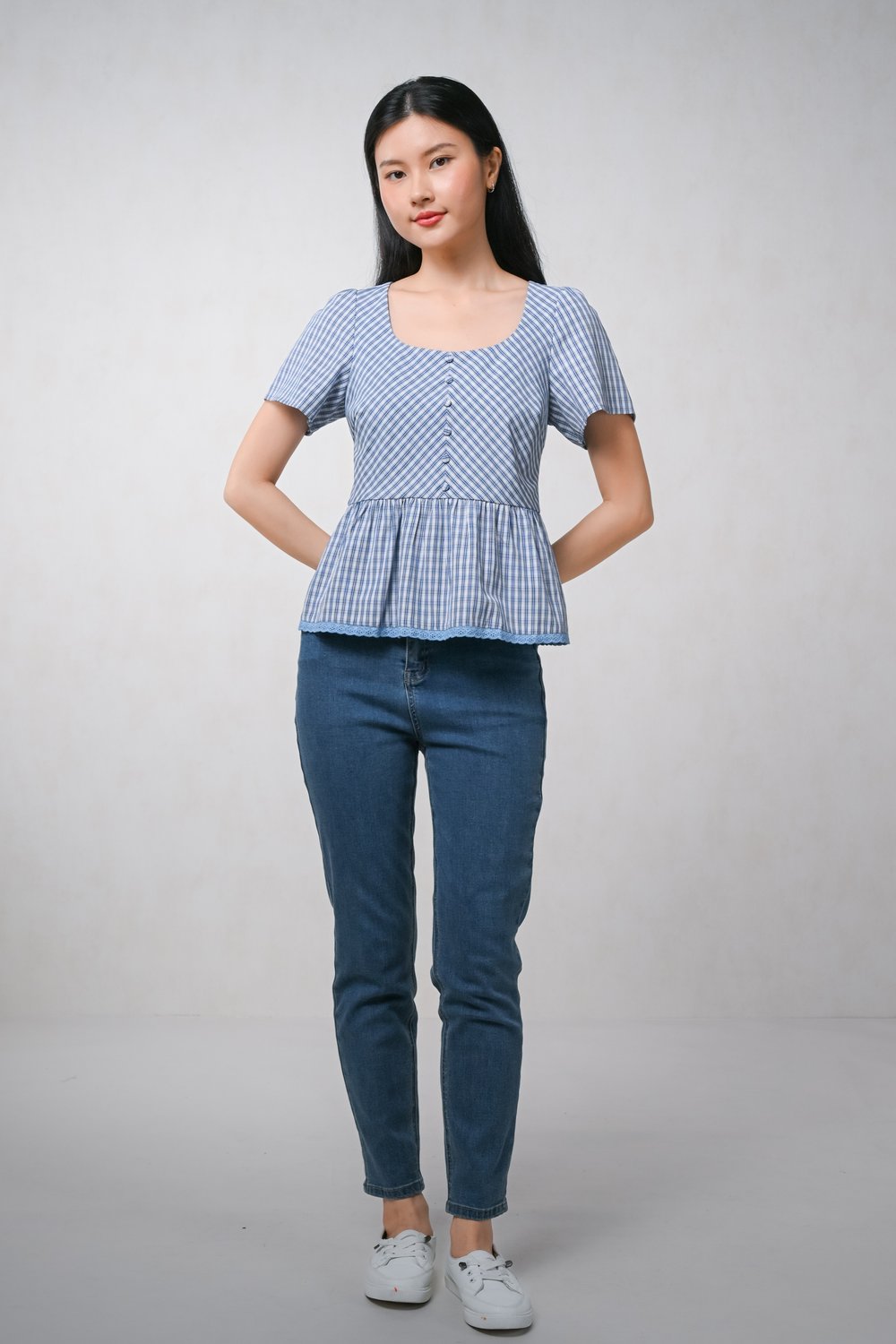 CARA PLAID PEPLUM TOP