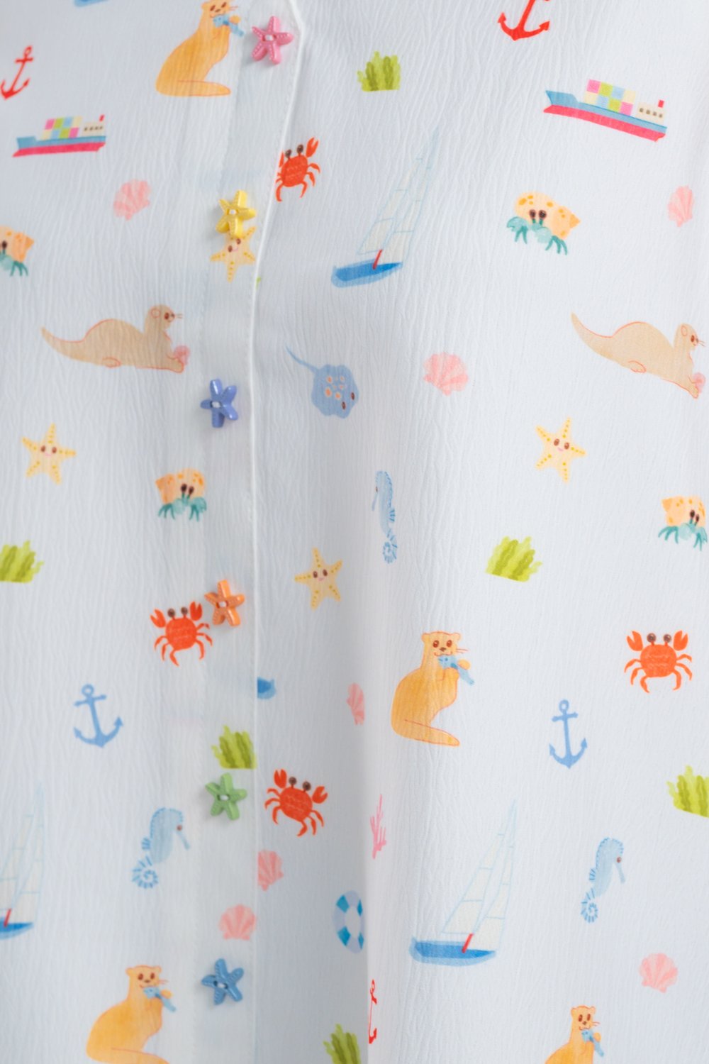COASTAL CUTIES TWO-WAY BUTTON TOP