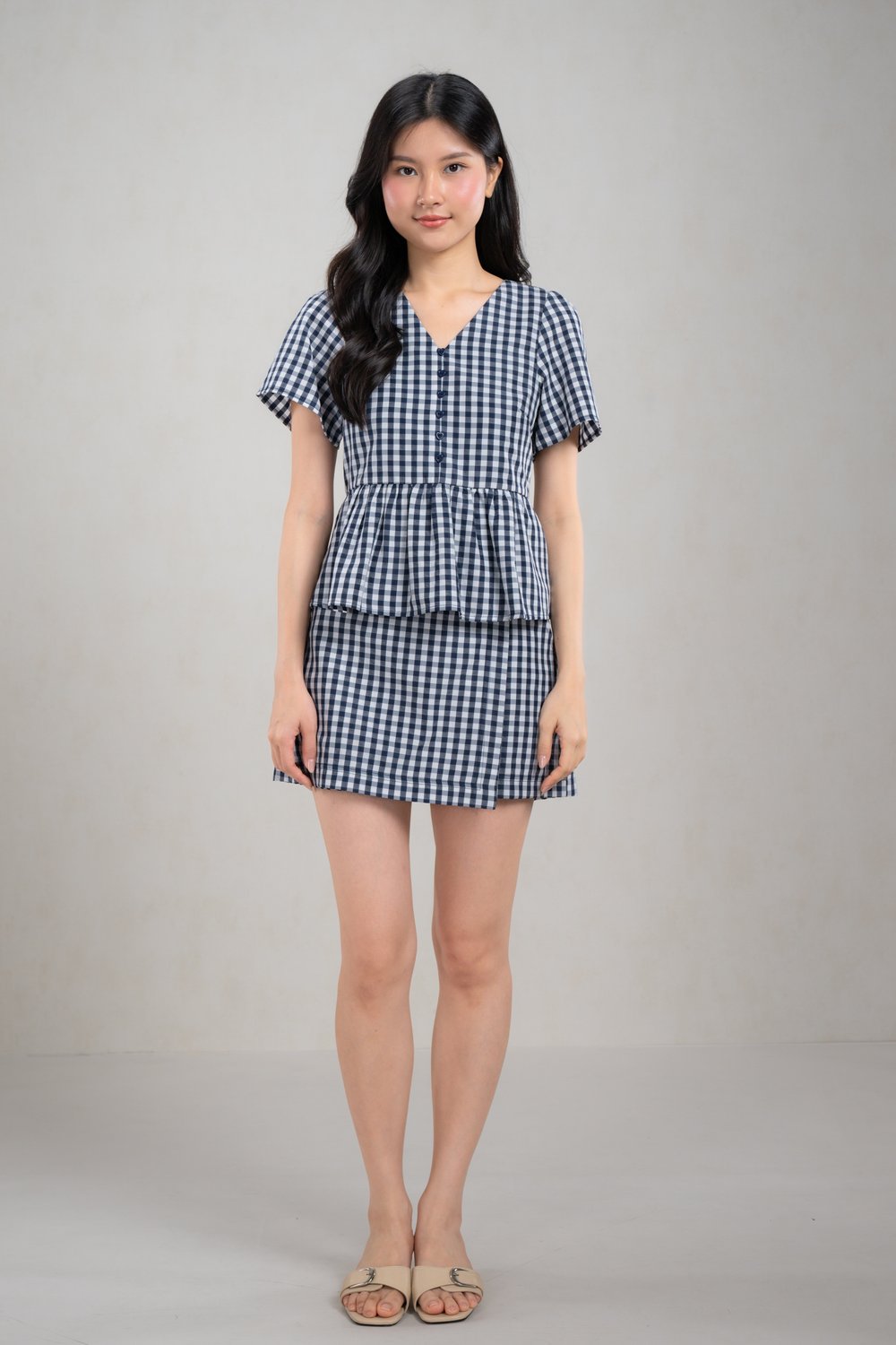 KERRIE GINGHAM SLEEVED PEPLUM TOP IN NAVY