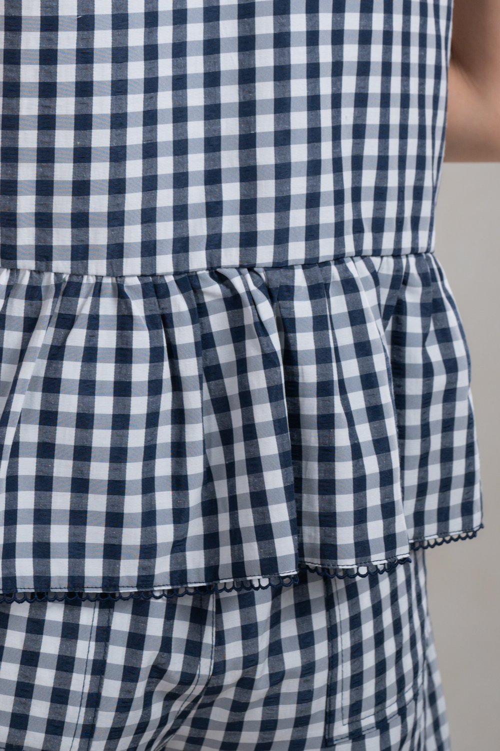 WYLIE GINGHAM SLEEVELESS TOP IN NAVY