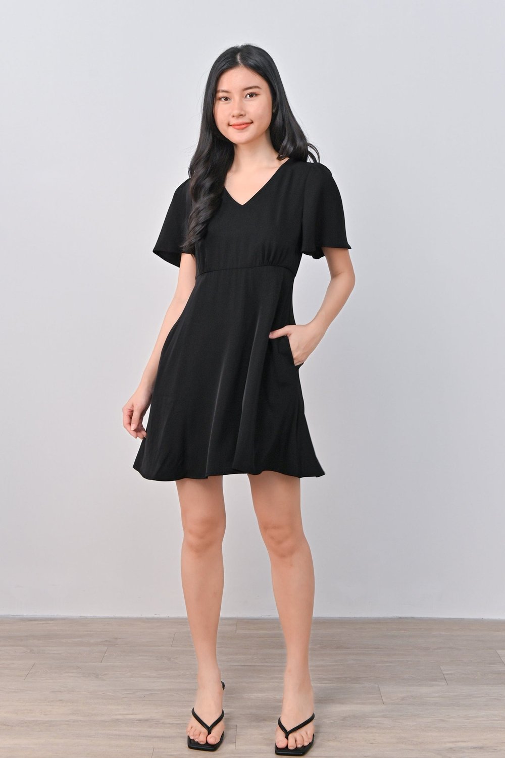 DONELLA V-NECK DRESS-ROMPER IN BLACK