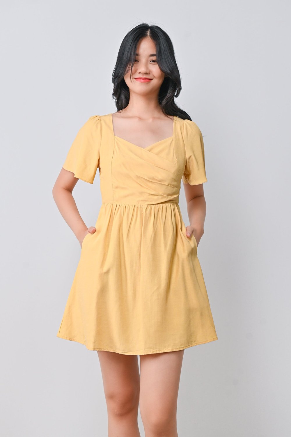 REGINE PLEAT DRESS-ROMPER IN YELLOW
