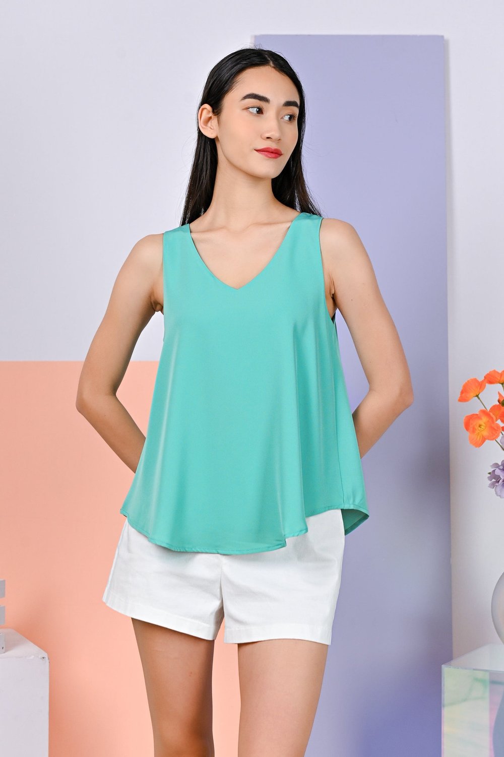 JENESIS CURVED-HEM TOP IN CYAN